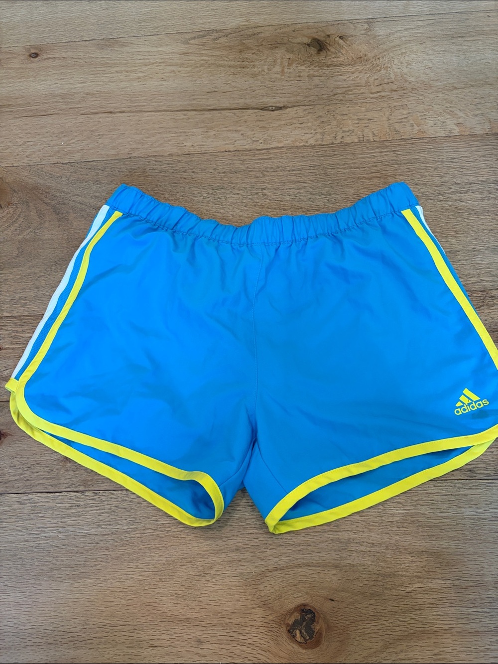 adidas Women's Blue Athletic Shorts with Yellow Trim